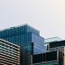 平面设计师陈思雨头像，女性，创意工作者气质，背景为设计工作室